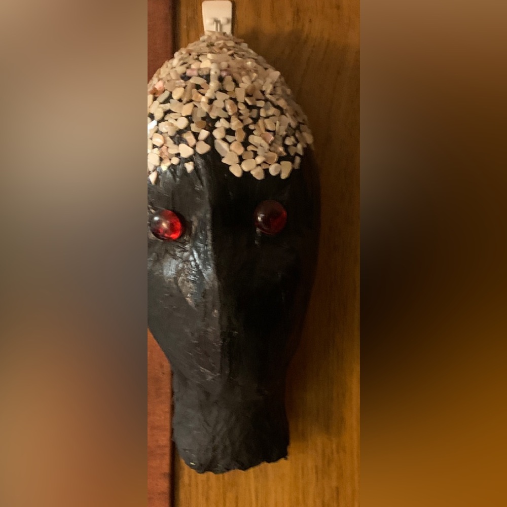 Papier-mâché head with mother of pearl hair
